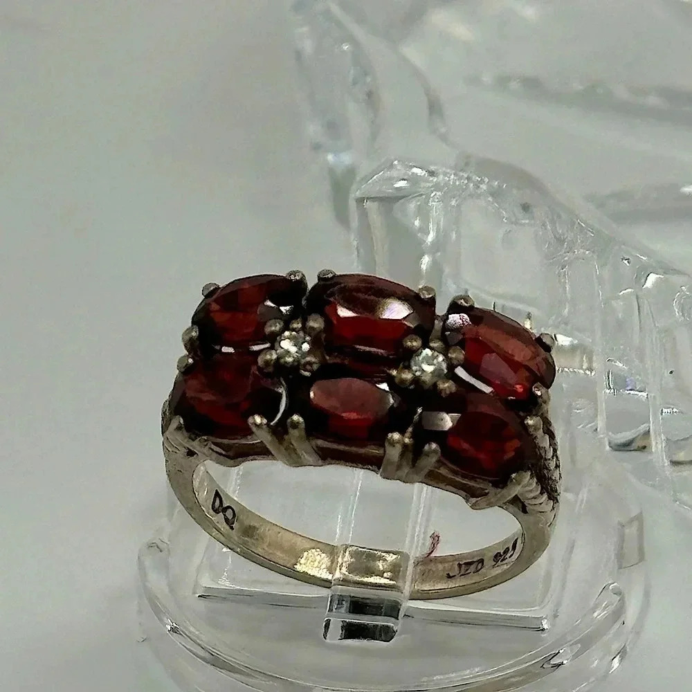 Garnet and Sterling Silver band ring Stamped JED 925 DQ. Size 6. Vintage ring.